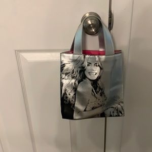 A small Victoria Secret Heidi Klum Supermodel bag